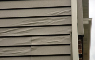 melted-siding - Siding Pros Of Idaho